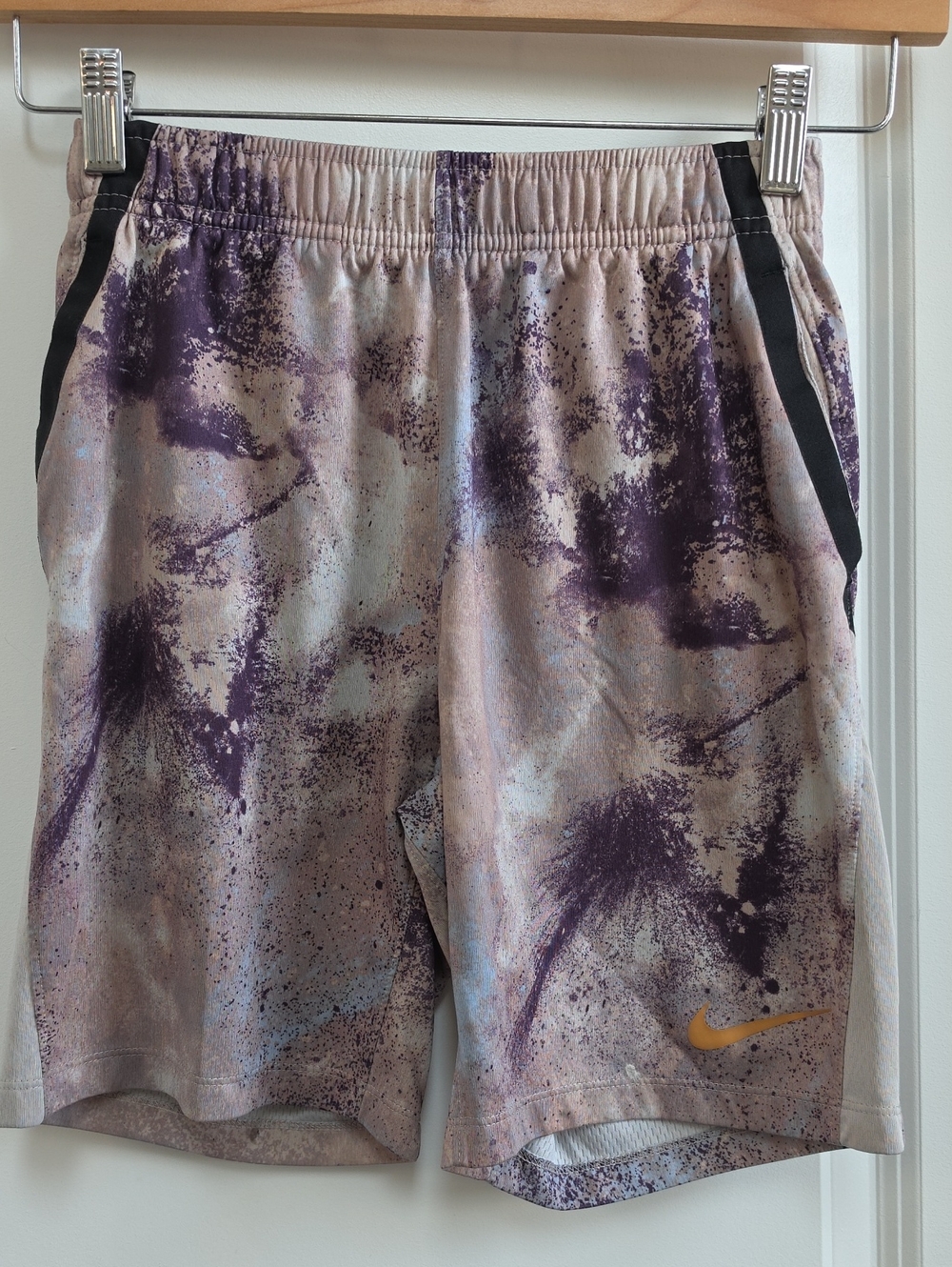 Nike Kids Purple Splash Print Shorts with Black Trim and Yellow Swoosh